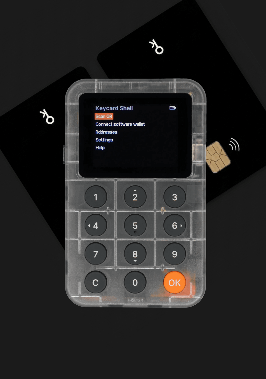 Dispositivo electrónico translúcido con teclado y pantalla sobre fondo negro