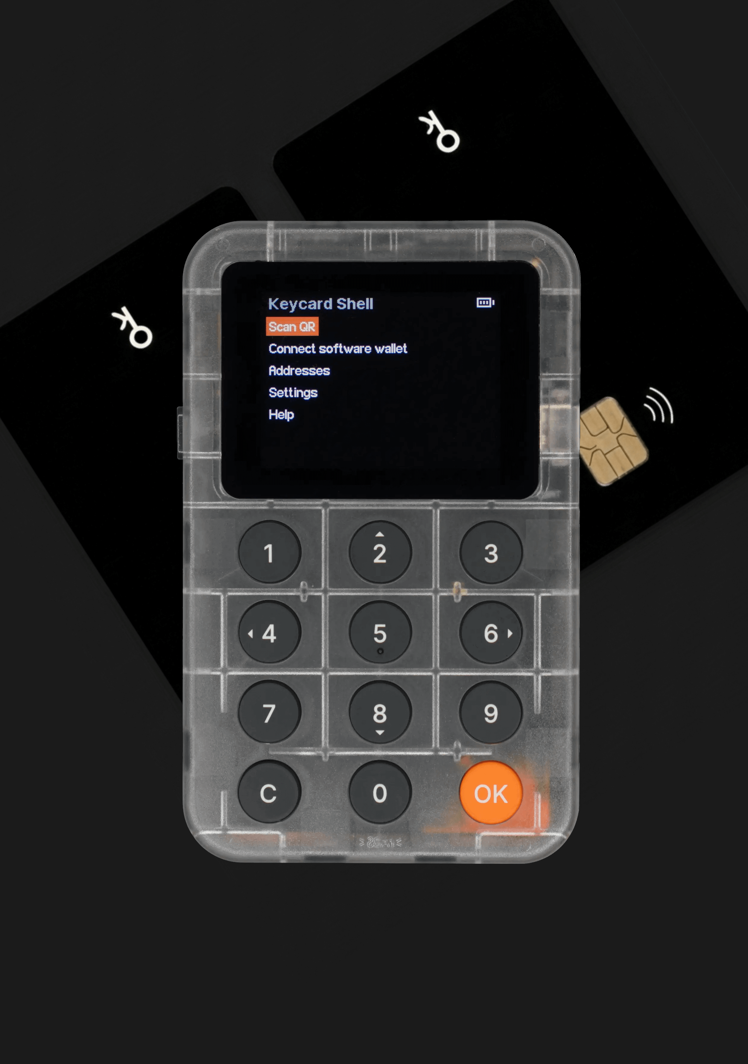 Dispositivo electrónico translúcido con teclado y pantalla sobre fondo negro