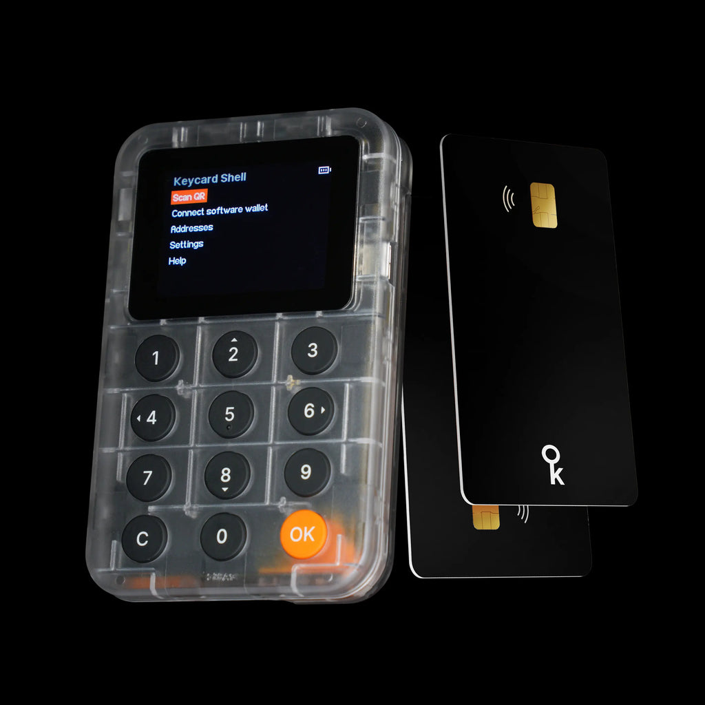 Transparent electronic device with keypad and screen next to a SIM card on a black background